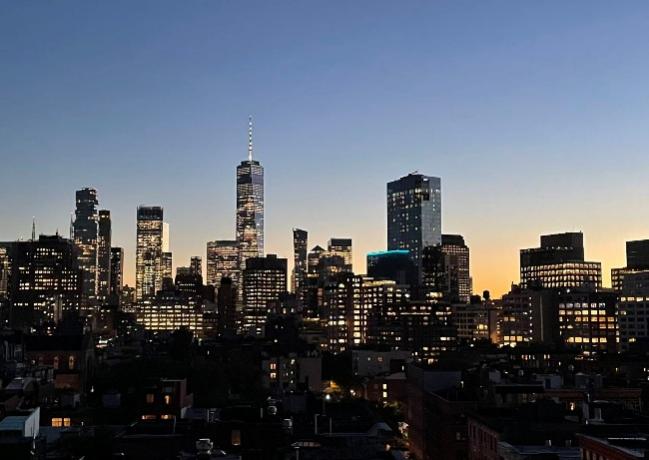 A city skyline at night

AI-generated content may be incorrect.